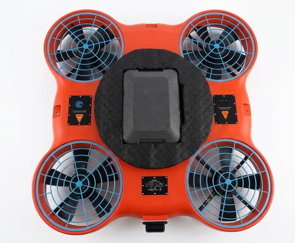 Orange AquaBot Flying Lifeboat with four guarded ducted propellers