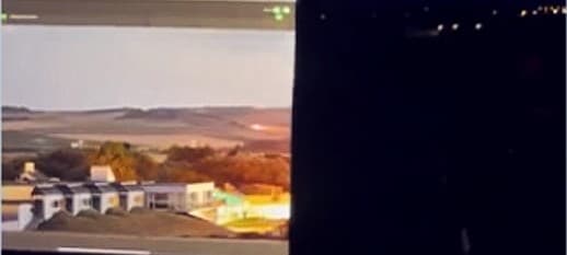 Manufacturer test footage of a rooftop scene at night